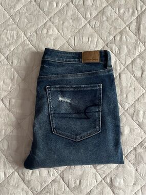 American Eagle Tomgirl Dark Blue Distressed Jeans